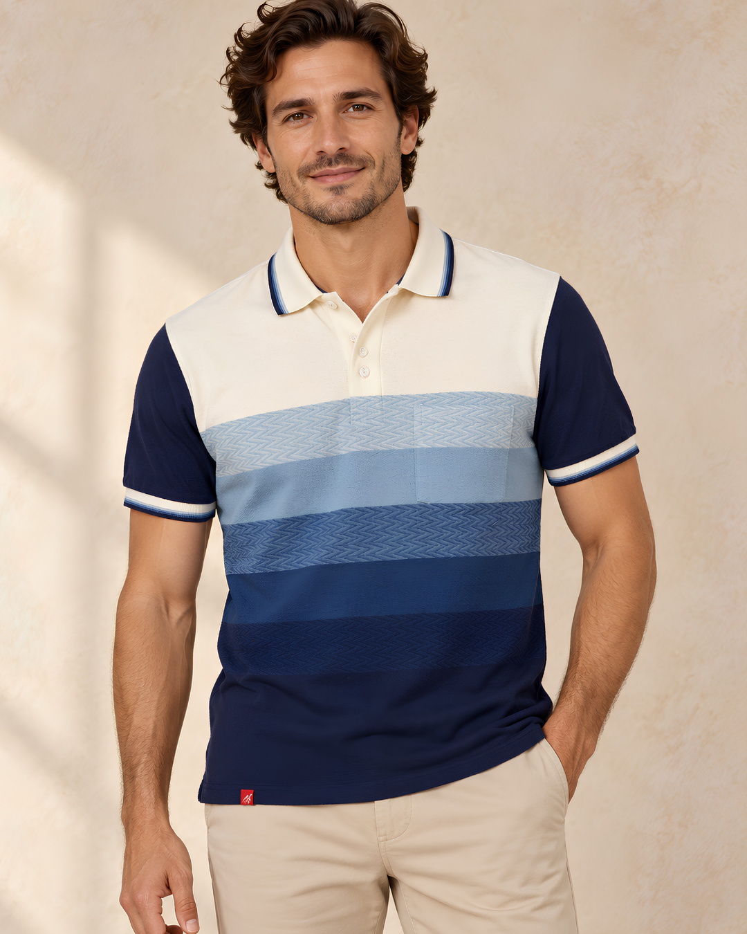 The Ombre Stripes Designer Polo in Saturn Blue, front view with jacquard-textured ombre stripes