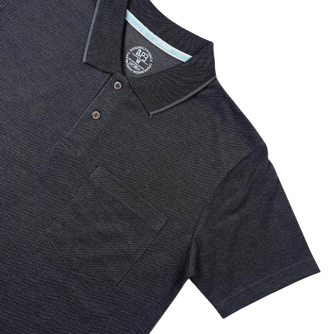 Dark gray polo shirt with a brand logo on a white background