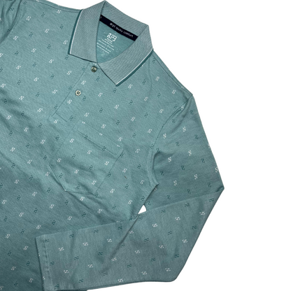 A green designer polo shirt with a pattern of small, white geometric shapes and a two-button placket.
