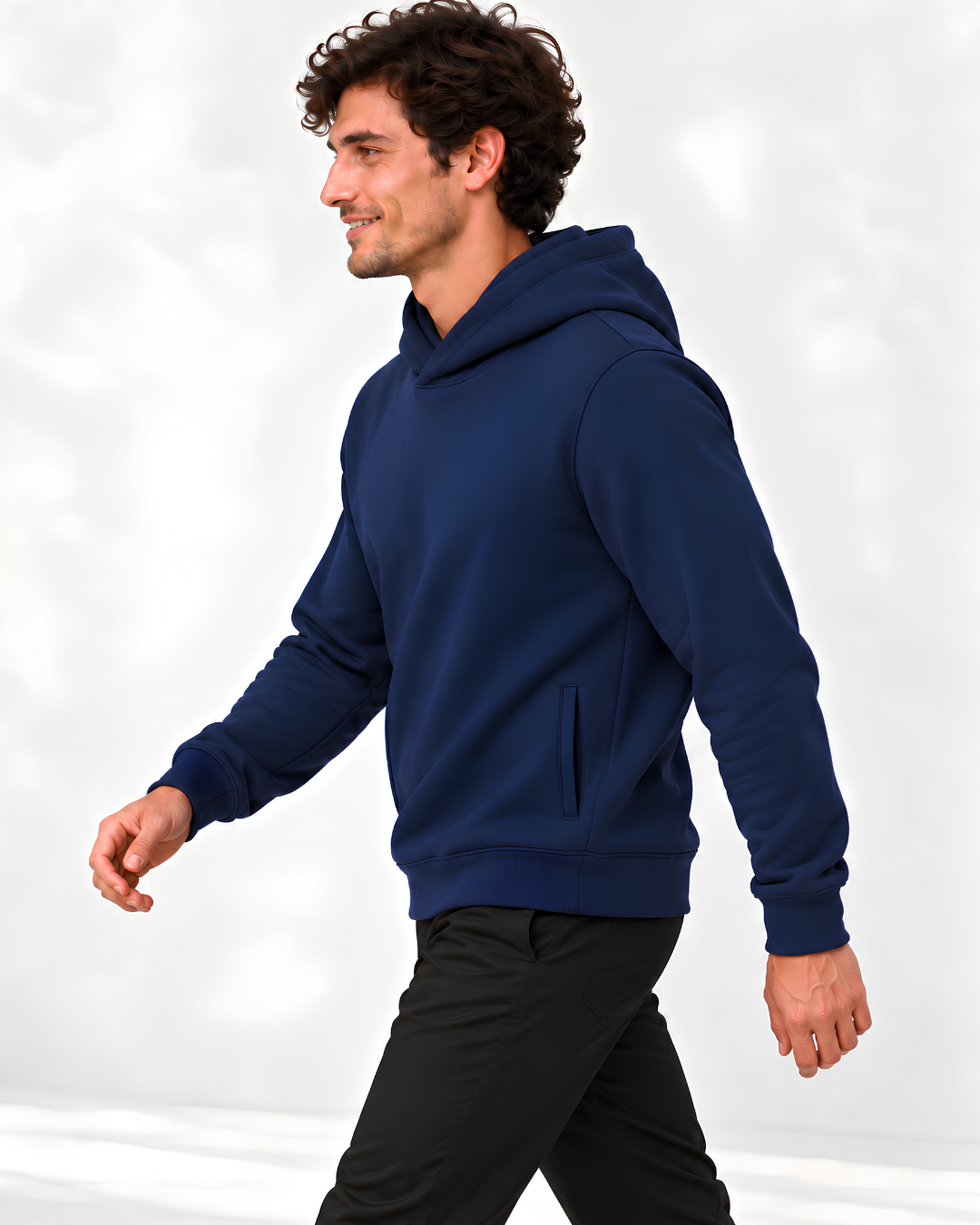 Man walking in the P3 100% cotton French terry hoodie in Ocean Depth navy – side view