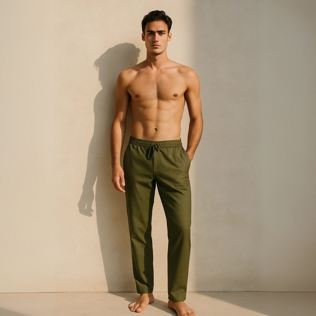 Model bare body wearing Olive Green Track Pants