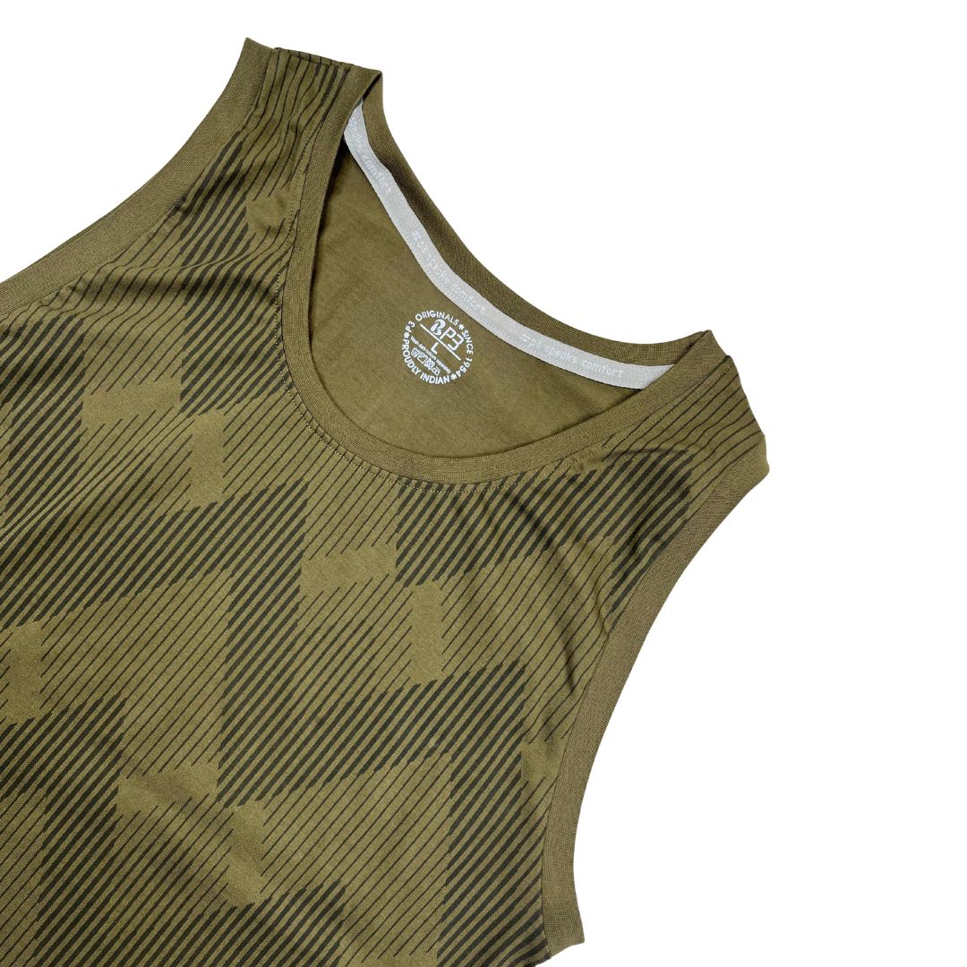 Green tank top with a pattern on a white background