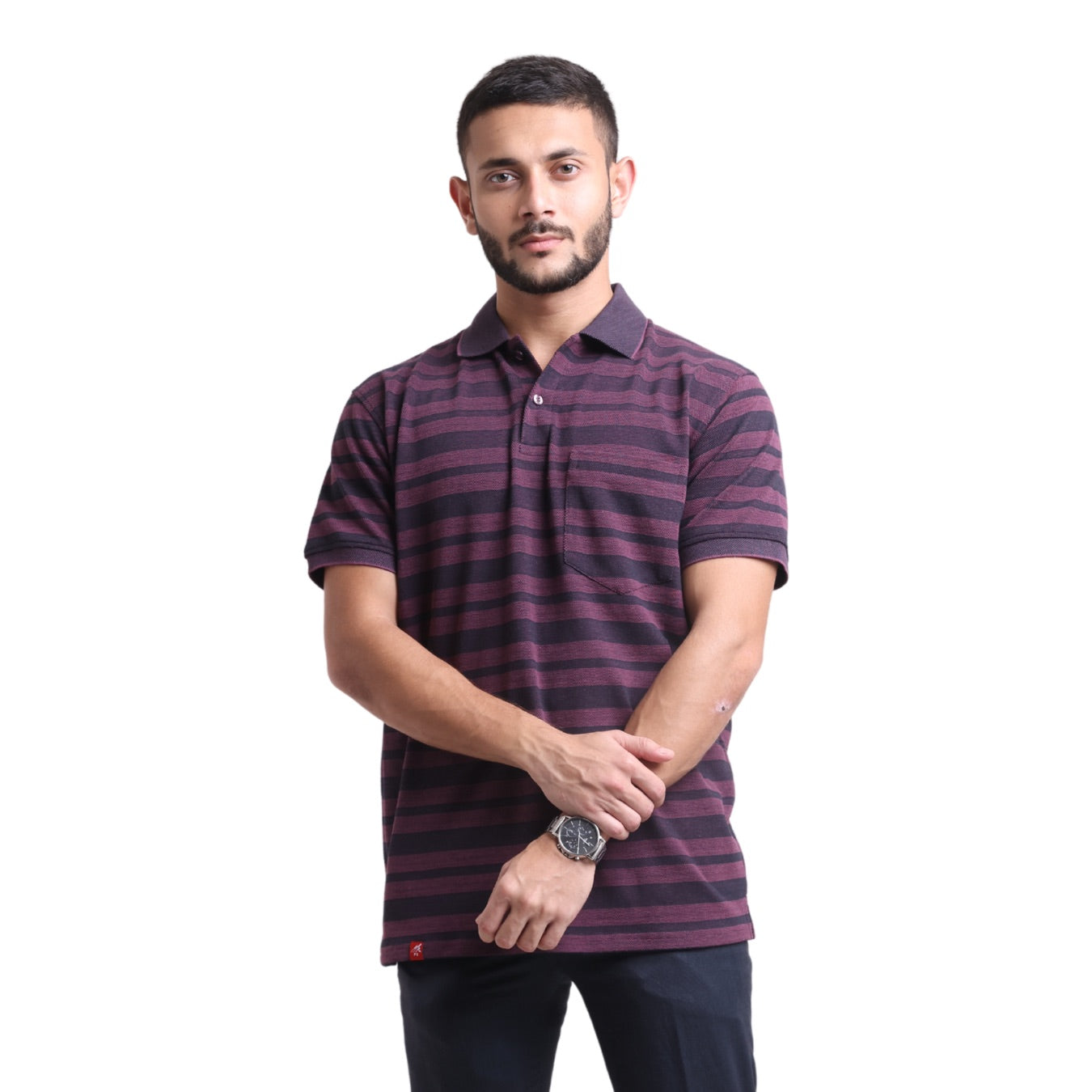 A man wearing a purple and navy striped designer polo shirt.